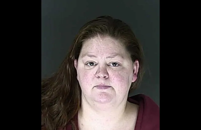 Woman accused of feeding neighbor's cat to dogs