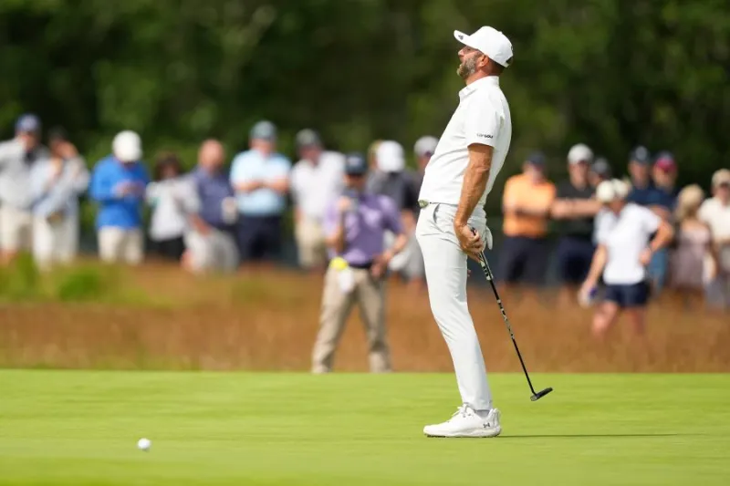 Dustin Johnson goes from 1 shot behind to scrambling to make the U.S. Open cut