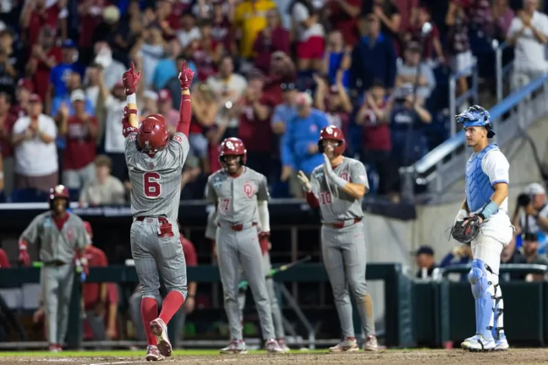 Oklahoma rolls past Tar Heels 13-2 for 1st national championship since 1994 and SEC's 7th in a row