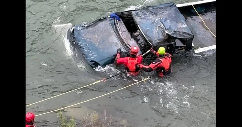 Truck careens through guardrail and rolls into Snake River near Alpine