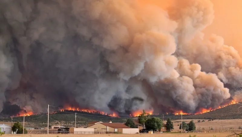 Fast-moving wildfires scorch thousands of acres across the West, and there's more danger ahead