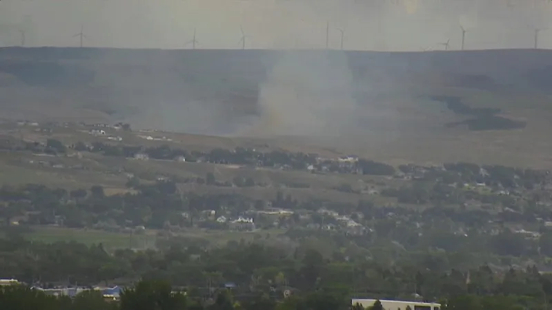 Public urged to avoid Ammon Foothills fire area as traffic hinders Firefighters