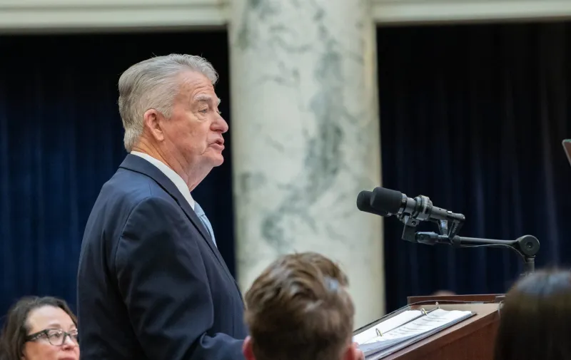 Little lauds Idaho's bottom line - but downplays how Idaho got there