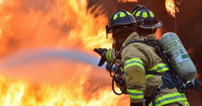 Interstate 15 partially shut down after pickup truck fire sparks brush blaze near Malad