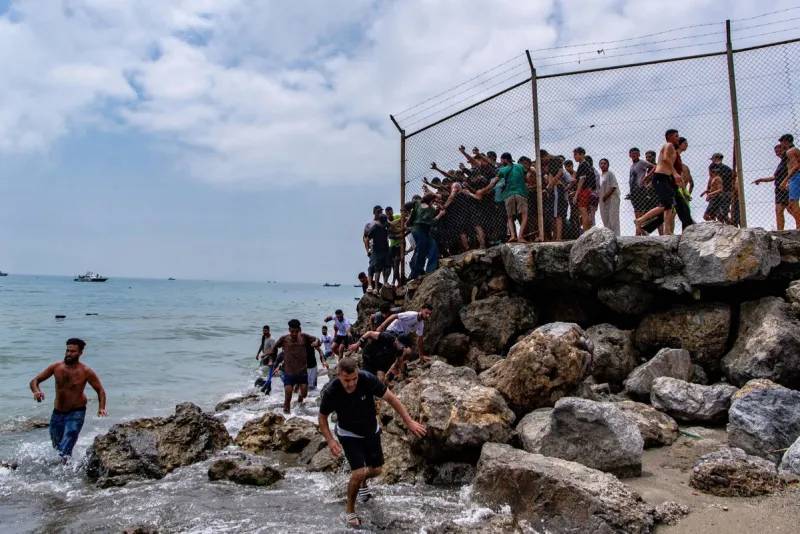 Spain says most of the 50,000 migrants who crossed into its territory from Morocco have returned