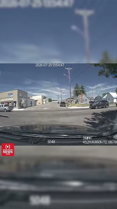 Dashcam video shows officer nearly hitting motorcyclist at intersection (Video)