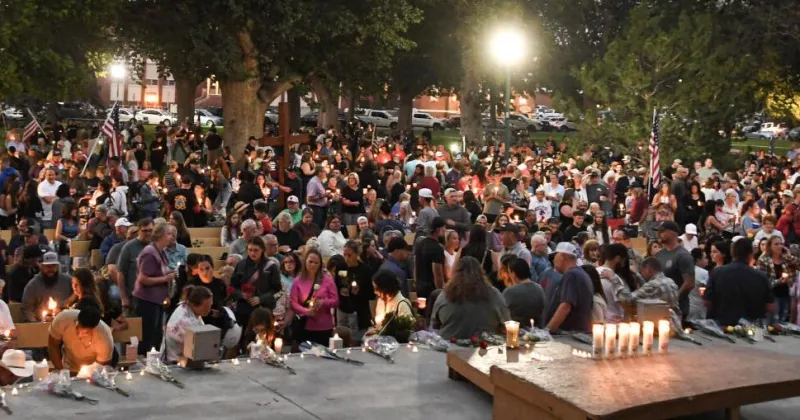 "We cannot let the darkness win," hundreds gather at vigil