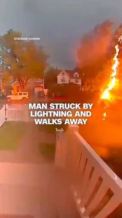 Man struck by lighting and walks away. Video from CNN (Video)