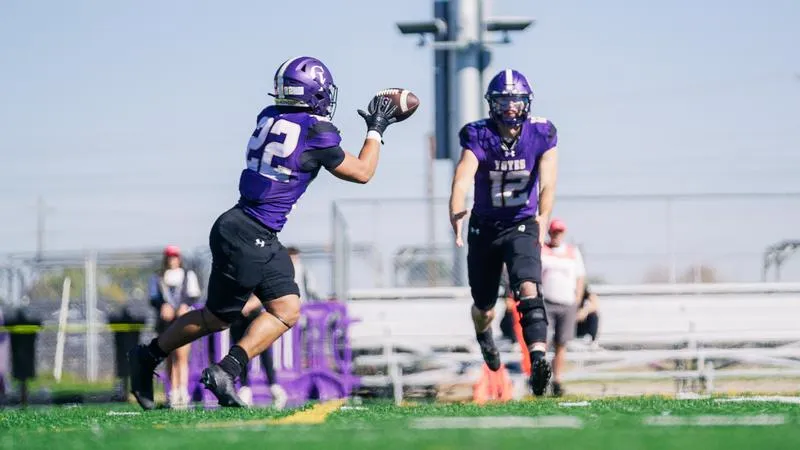 Byington's Five-TDs Power Yotes to 63-13 Home-Opening Win