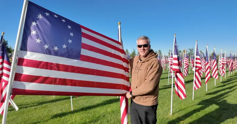 Kuna neighbors spend Labor Day packing up a unique display of 250 American flags