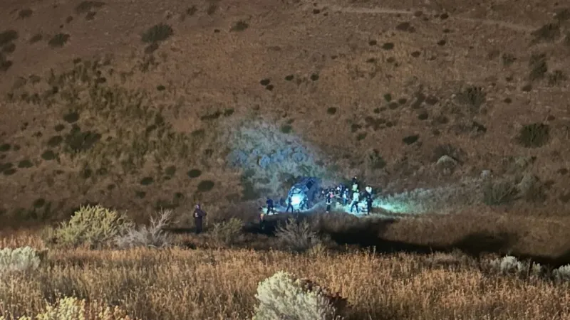 Boise firefighters rescue two after car rolled 120 yards off the side of 8th St.