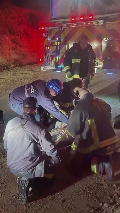 2 people hospitalized after vehicle rolls down a steep embankment (Video)