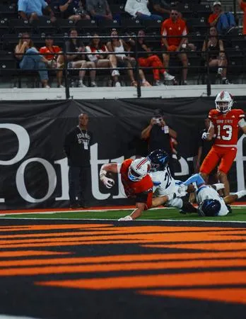 Bengals Roll Past San Diego, 59-17