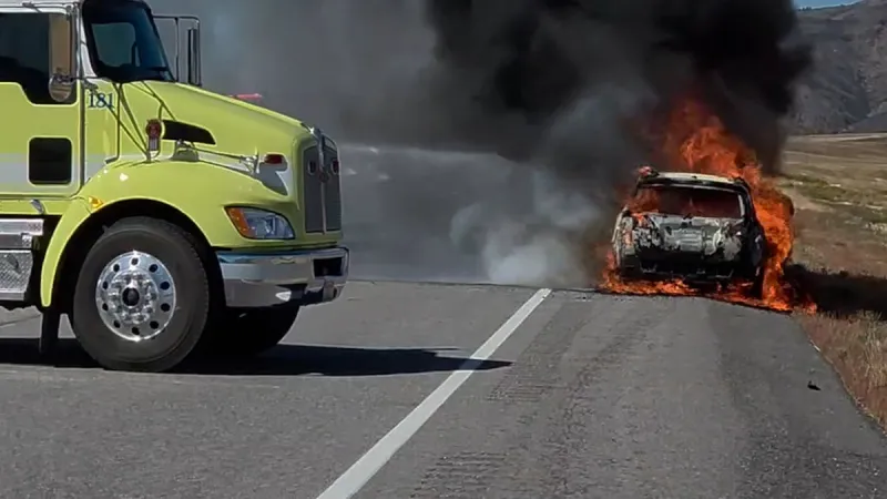 Pickup truck driver saves elderly man from burning car along US 26