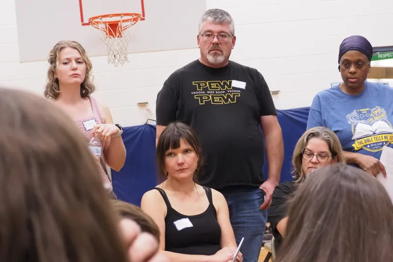 Parents fill McMillan Elementary gym to oppose closure
