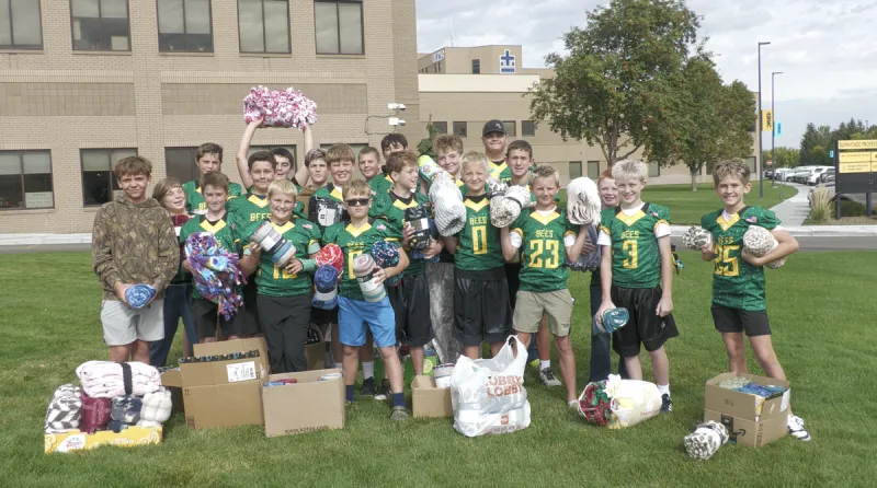 Bonneville Grid Kid Gold Team donates 104 blankets to EIRMC's Ronald McDonald Family Room