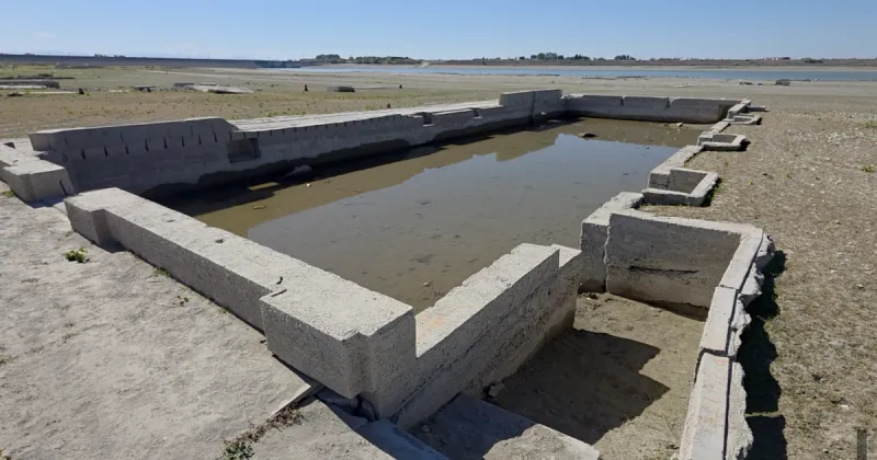 Low water levels at American Falls Reservoir reveal the original town that moved uphill a century ago