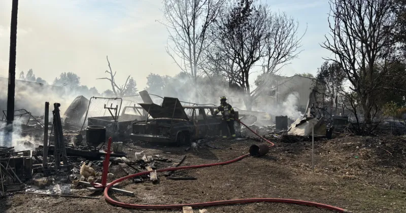 Fire in southeast Nampa consumes around 2 acres of land, destroys buildings and vehicles