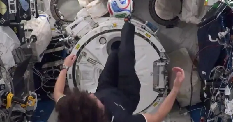 Astronaut does bicycle kick in space during soccer science lesson