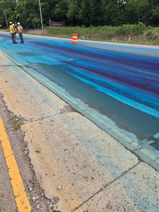 SPILL TURNS HIGHWAY BLUE