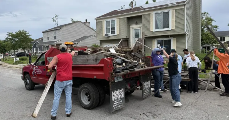 Community members gather to clean up storm damage in Merrillville