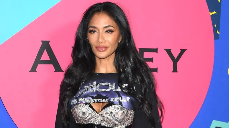 Nicole Scherzinger flaunts toned abs in blue bikini during birthday beach vacation