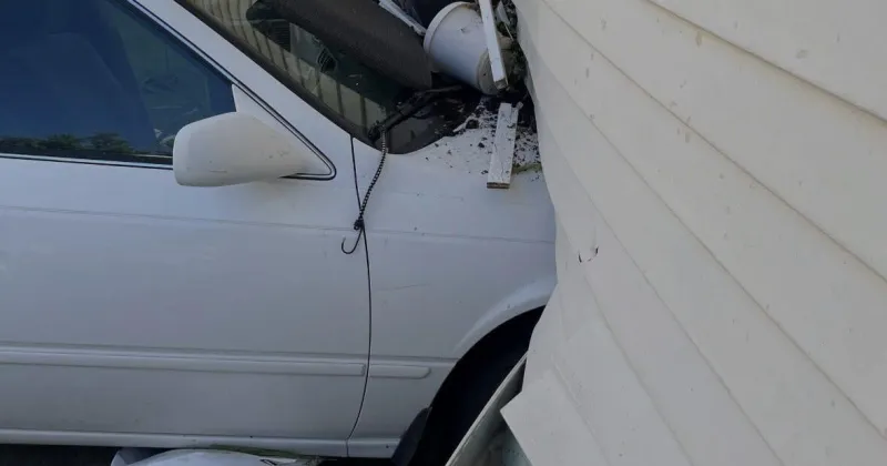 Vehicle crashes into structure in Hobart, fire department warns of active operation