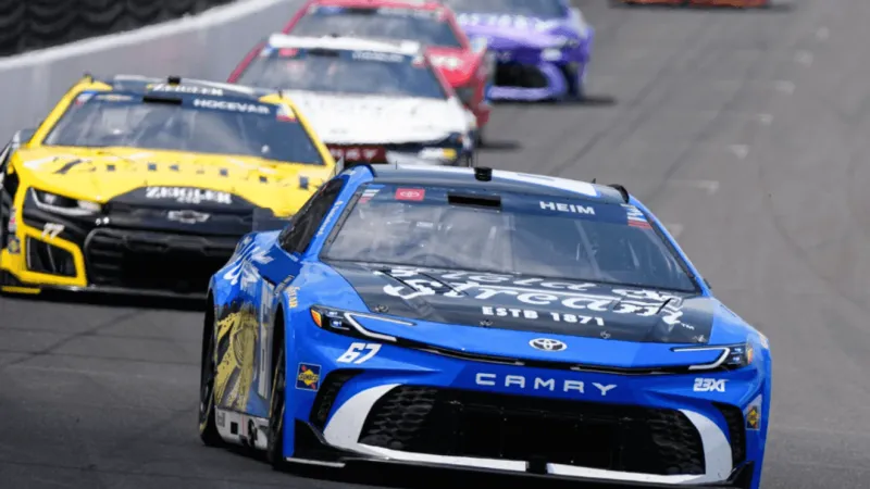 Corey Heim executes daring pass on final restart and holds on for Brickyard 400 victory