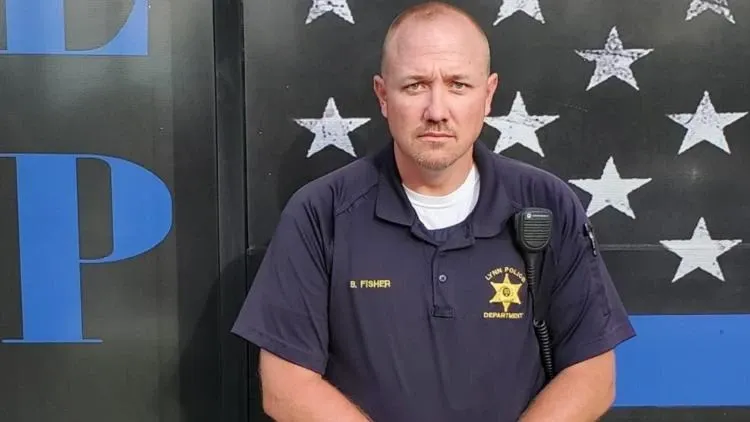 HUNDREDS ATTEND VIGIL FOR FALLEN TOWN MARSHAL