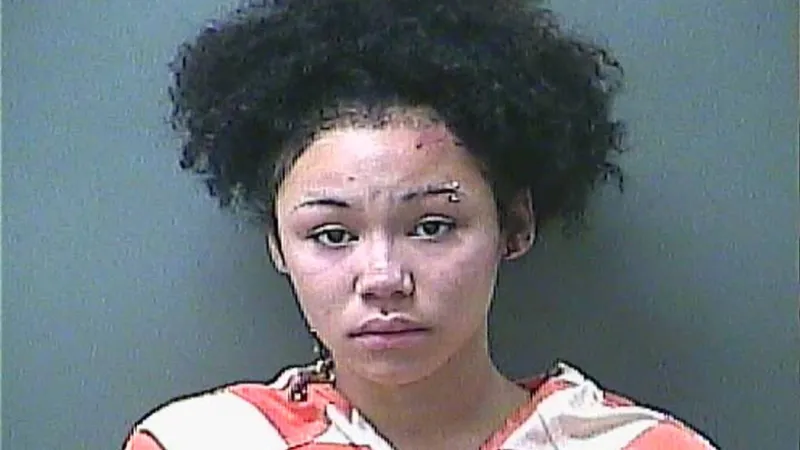 Woman charged, three fighting for life after police chase ends with crash into guardrail