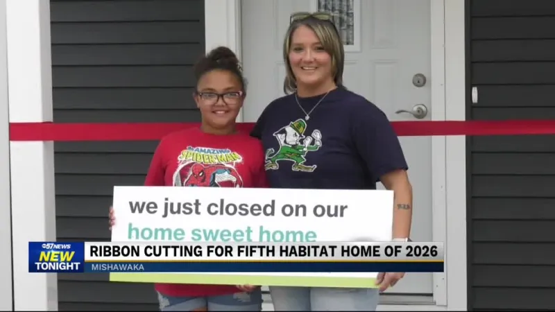 Local family celebrates moving into Habitat for Humanity home