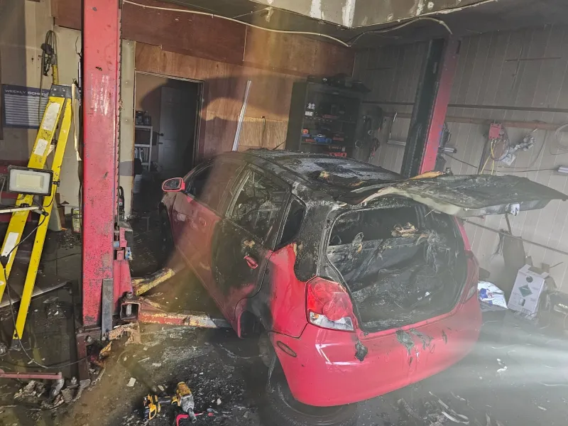 Baugo Township vehicle fire escalates into structure fire; blaze extinguished