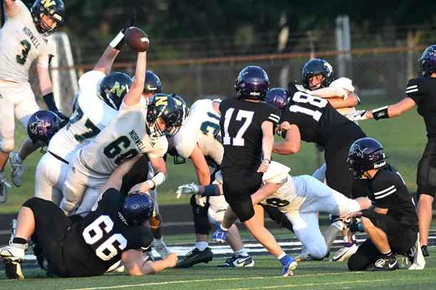 Lions hand the Knights their first loss in NE8 opener