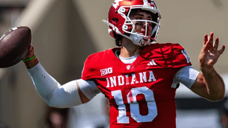 Josh Hoover throws 4 TD passes as No. 6 Indiana opens title defense with a 52-16 rout of N