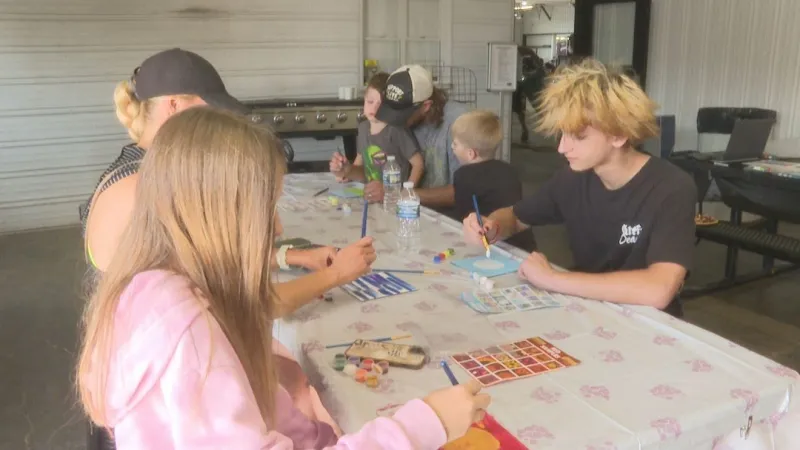 Visitors leave mark on mural by painting tiles at Shipshewana Flea Market