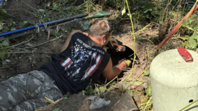 Firefighters rescue dog stuck in storm drain pipe in LaPorte County