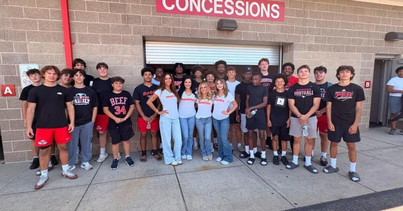 Munster High School football team's volunteer efforts earn it Labor Day lunch from Hooters