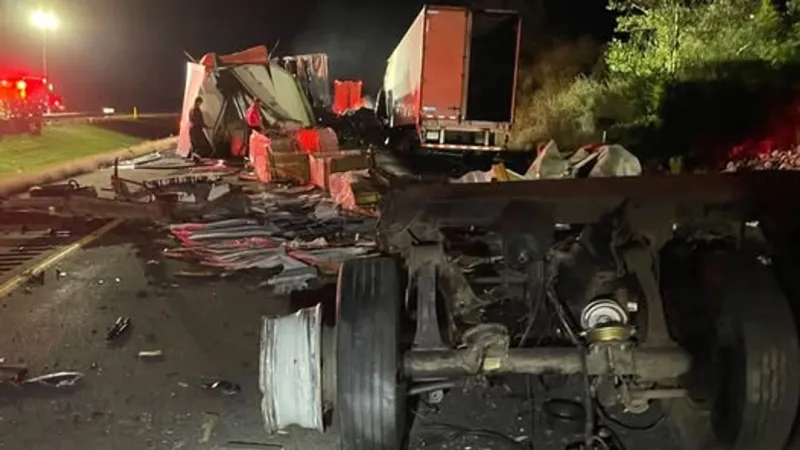 Toll Road traffic delay after semi crash scatters thousands of green bean cans near Angola