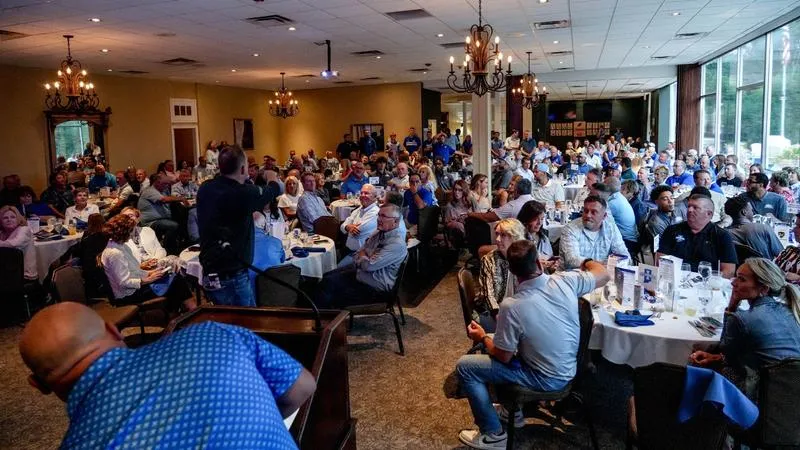 Men's Basketball Reception and Golf Outing Surpasses $200,000 Raised