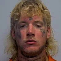 Porter County cop injured as man slips out of pants to flee