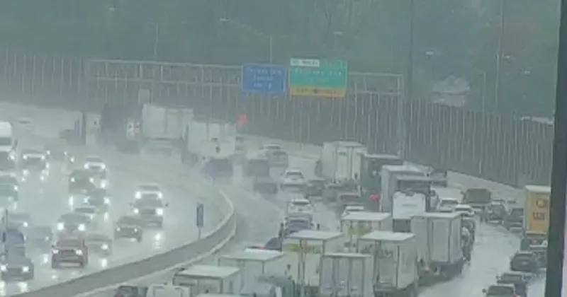 Stalled vehicle clogs rainy Sunday traffic on Interstate 80/94