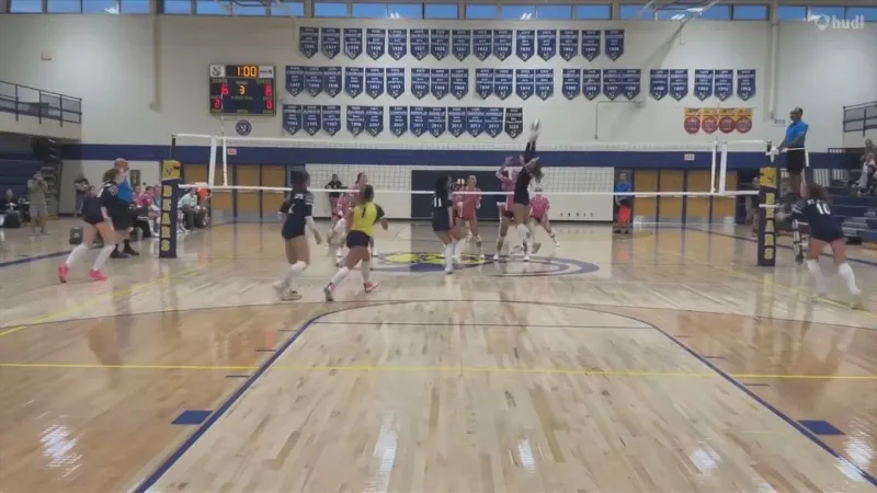 Volleyball rivals face off for 'Dig Pink' cancer care fundraiser match