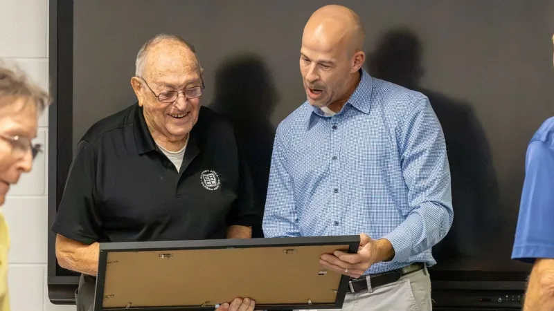 Elkhart Area Career Center dedicates renovated motorsports space to longtime educator