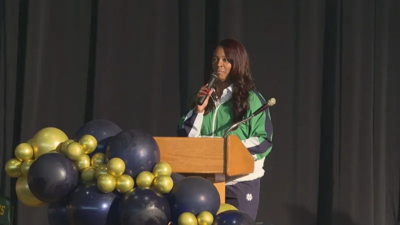 Notre Dame Women's Basketball Coach surprises students at Washington High School