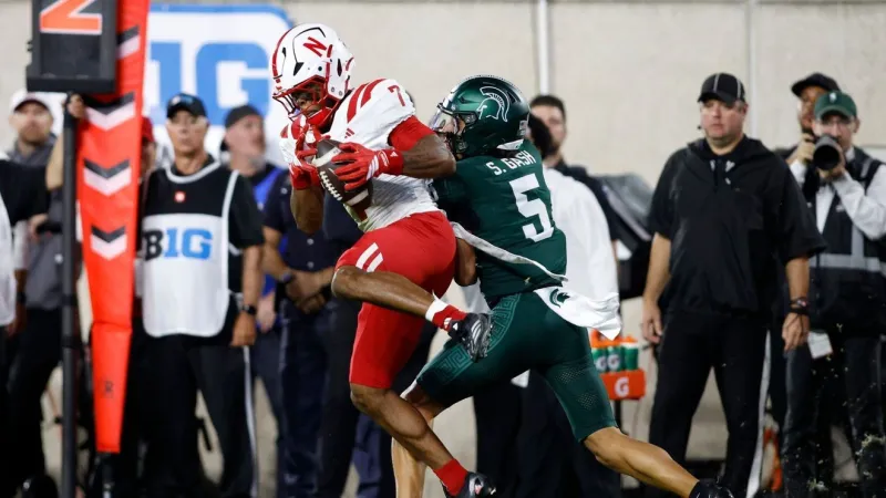 Colandrea's two TD passes and stout defense lifts unbeaten Cornhuskers past Spartans