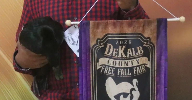 4-H members show grand champion birds