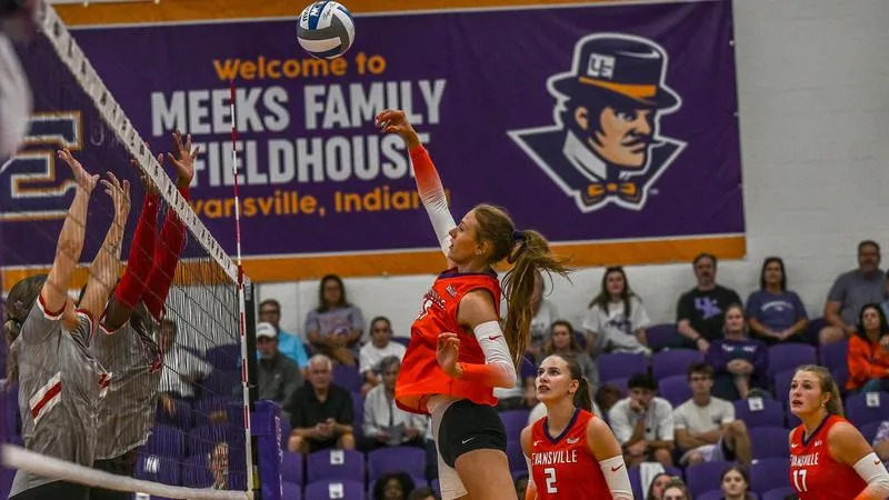 Laubach and Fisher lead volleyball to road win over Racers