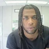 Man at-large charged in Northwest Indiana I-65 carjacking
