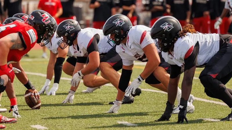 Football HIts The Road to Battle Blue Tigers