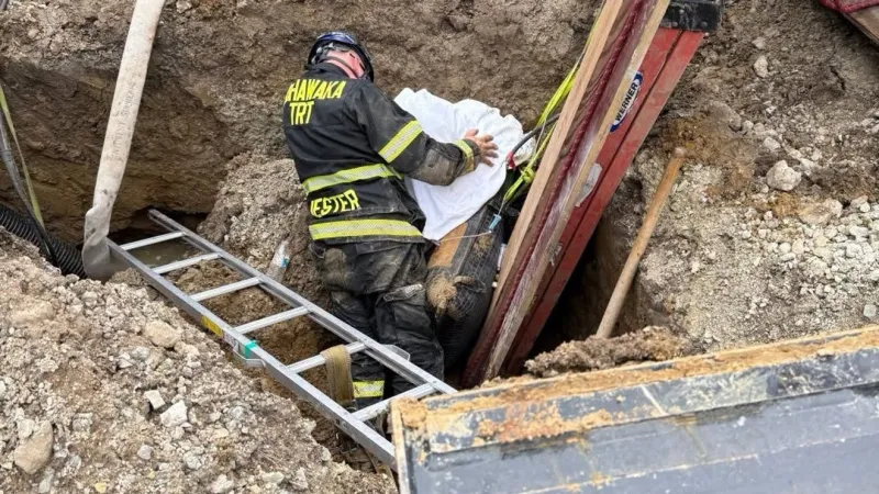 Firefighters rescue man trapped in trench in Mishawaka